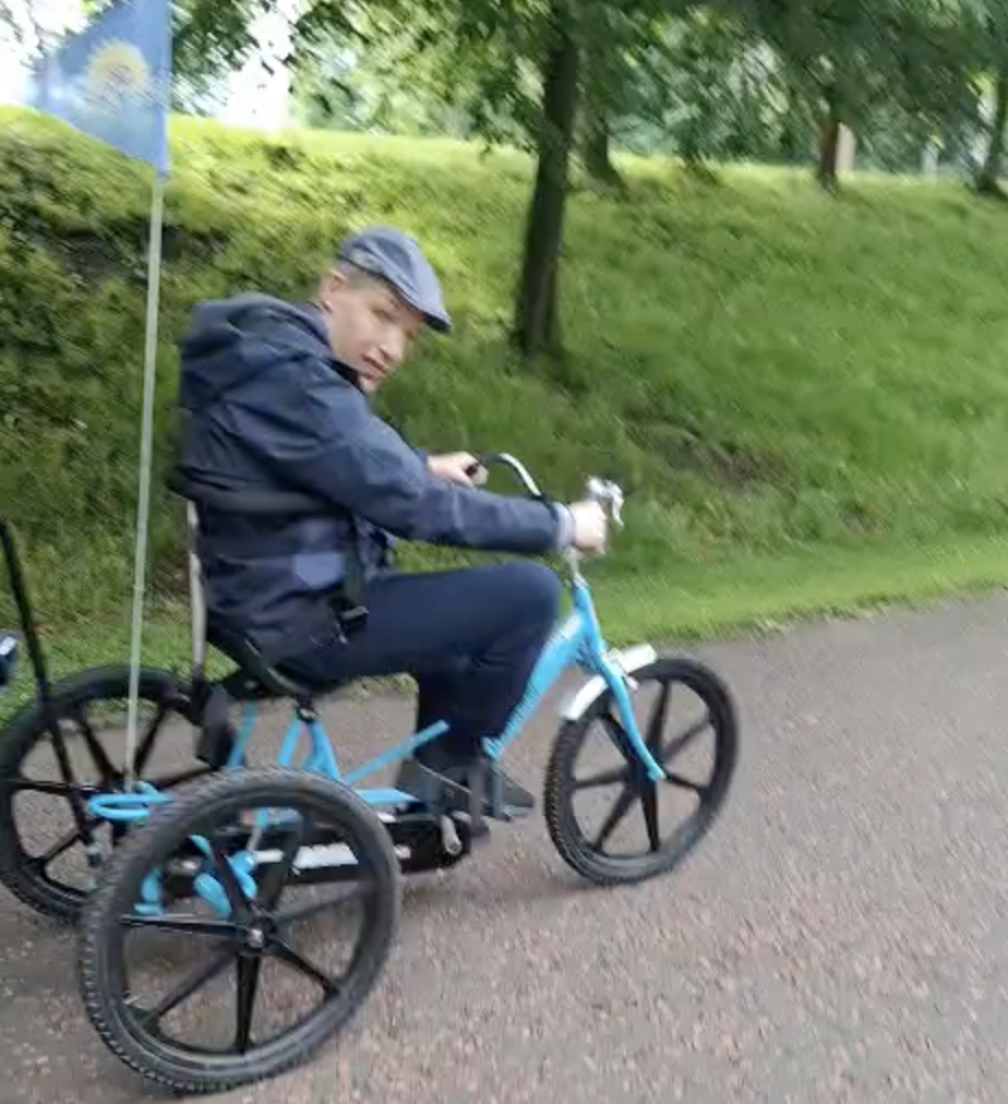 Bill at Glasgow Green riding his bike